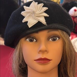 Chic Black Beret with Cream Flower Accent
